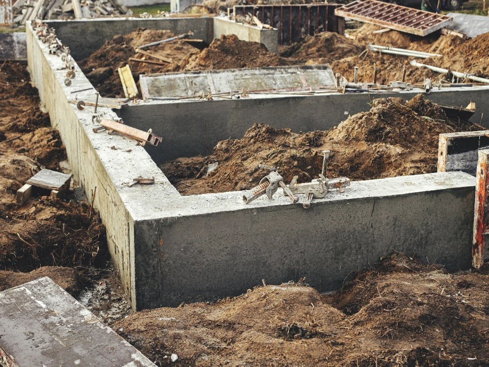Cast concrete footings and stem walls forming a building foundation in Midland, Texas