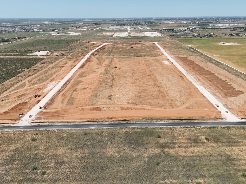 Pony Express Subdivision: Mass grading under way with the main street corridor cut through the center of the site.